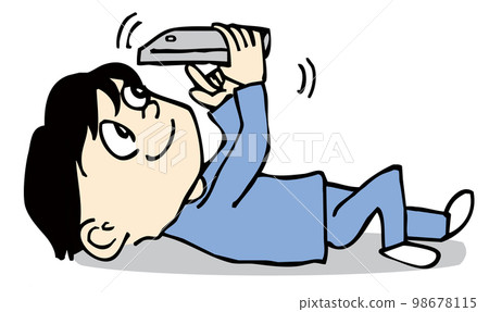 A person lying on his back and fiddling with his mobile phone A person lying on his back and fiddling with his mobile phone 98678115