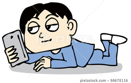 A person lying on his stomach and fiddling with a mobile phone A person lying on his stomach and fiddling with a mobile phone 98678116