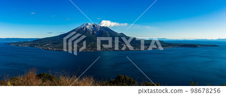 Snow-capped Sakurajima from Yoshino Park Snow-capped Sakurajima from Yoshino Park 98678256