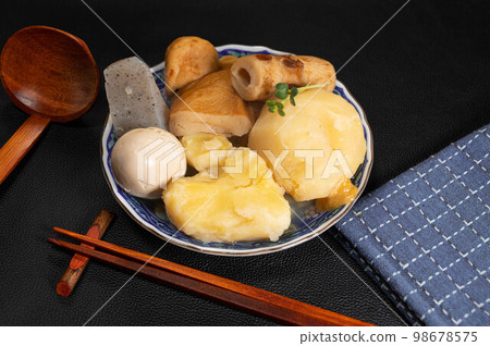 Oden on black background Oden on black background 98678575