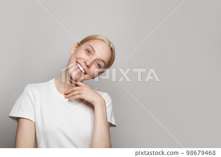 Portrait of  nice cool attractive lovely cheerful woman isolated on grey background 98679468