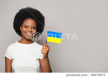 Ukrainian woman holding flag of Ukraine Education, business, citizenship and patriotism concept 98679673