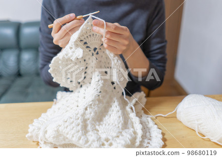 Knitting woman, crochet 98680119