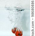 Tomato water drop drops water 98680886