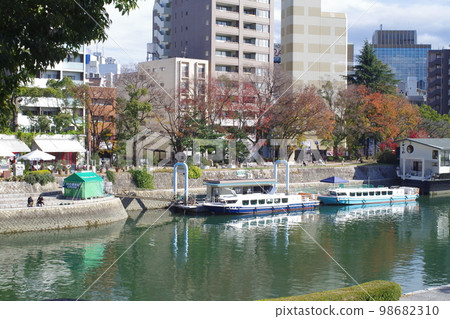 View of shops along the Motoyasu River View of shops along the Motoyasu River 98682310