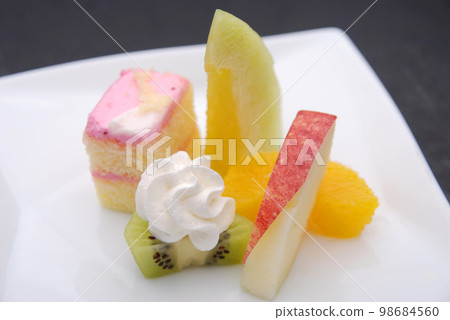 Dessert platter of fruit and cake Dessert platter of fruit and cake 98684560