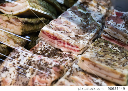 salted cooked pork belly on store counter salted cooked pork belly on store counter 98685449