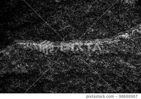 Rock texture. The surface of the stone is like a wall. White gray grunge background with copy space for design. 98688987