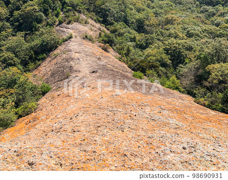 Traverse climbing in the Ono Alps: The summit of Mt. Traverse climbing in the Ono Alps: The summit of Mt. 98690931