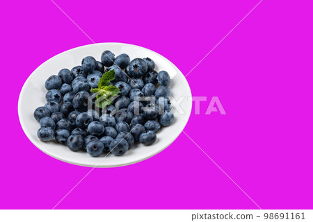 Blueberry in plate on isolated background 98691161