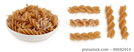 Wolegrain fusilli pasta from durum wheat in bowl isolated on white background with full depth of field. Wolegrain fusilli pasta from durum wheat in bowl isolated on white background with full depth of field. 98692914