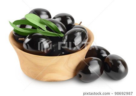 Black olives with leaves in wooden bowl isolated on a white background with full depth of field. Black olives with leaves in wooden bowl isolated on a white background with full depth of field. 98692987