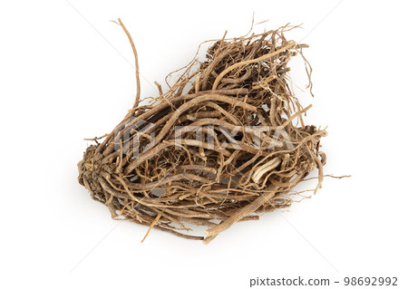 Dried Valerian root isolated on white background. Valeriana officinalis with full depth of field. Top view. Flat lay Dried Valerian root isolated on white background. Valeriana officinalis with full depth of field. Top view. Flat lay 98692992