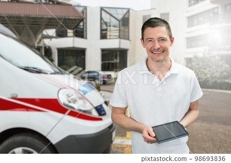 Male doctor on the background of ambulance Male doctor on the background of ambulance 98693836