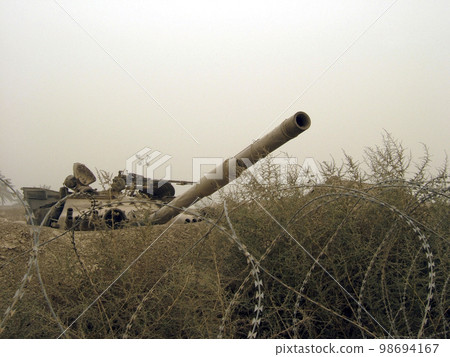 Military army vehicle tank on tracks with barrel after victorious war Military army vehicle tank on tracks with barrel after victorious war 98694167