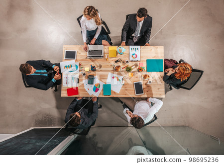 People work together in office as teamwork and partner People work together in office as teamwork and partner 98695236