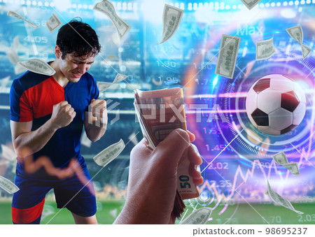 Soccer striker rejoices for the victory at the stadium. Online bet 98695237