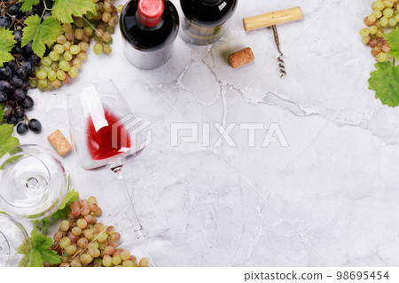 White, rose and red wine glasses and bottles White, rose and red wine glasses and bottles 98695454