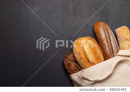 Fresh baked bread in bag 98695485