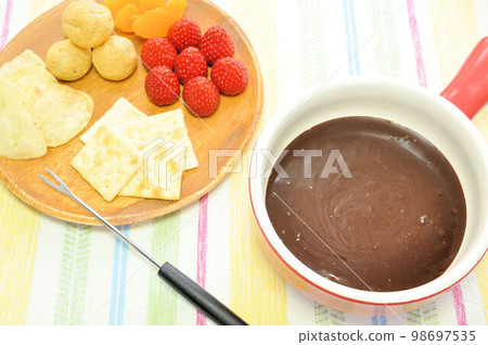 Chocolate fondue Chocolate fondue 98697535