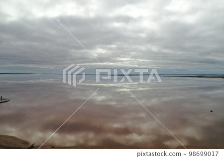 Clouds reflected on the surface of Pink Lake 98699017