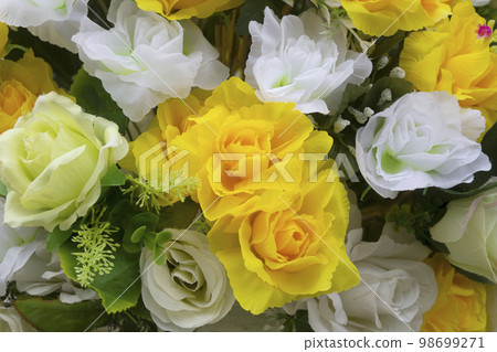Beautiful fake flowers made from fabric. Beautiful fake flowers made from fabric. 98699271