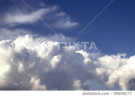 white clouds with sunlight on blue sky background white clouds with sunlight on blue sky background 98699277