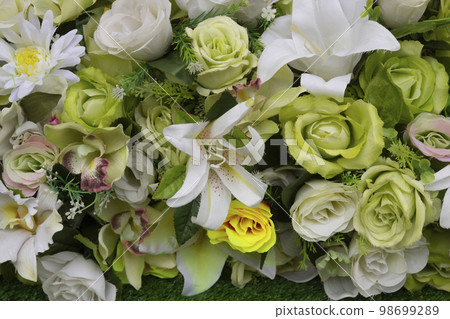 Artificial flowers made from beautiful colored fabrics. Artificial flowers made from beautiful colored fabrics. 98699289