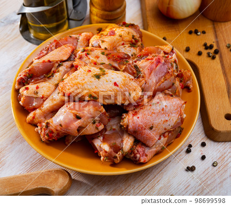 Raw shish kebab marinated chicken meat at plate, nobody Raw shish kebab marinated chicken meat at plate, nobody 98699598