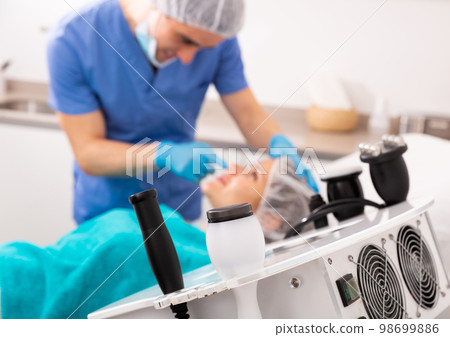 Closeup of equipment at clinic of aesthetic cosmetology 98699886