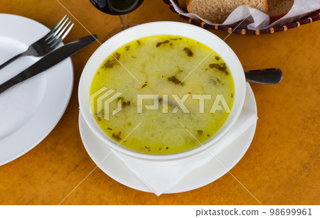 Thick chikhirtma soup in poultry broth with chicken meat Thick chikhirtma soup in poultry broth with chicken meat 98699961