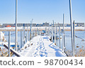 Snow-covered pier and Edogawa river 98700434