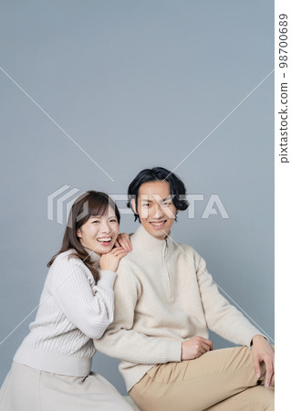 Cuddling couple couple photo pair look 98700689