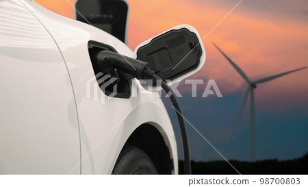 Progressive electric vehicle powered by clean energy generated by wind turbine. 98700803