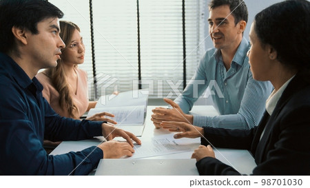 Commercial, agreement deal signed by competent people of several ethnicities. 98701030