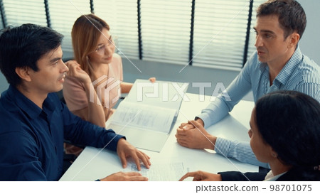 Commercial, agreement deal signed by competent people of several ethnicities. 98701075