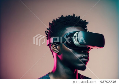 African man wearing virtual reality goggles standing studio clean background 98702236