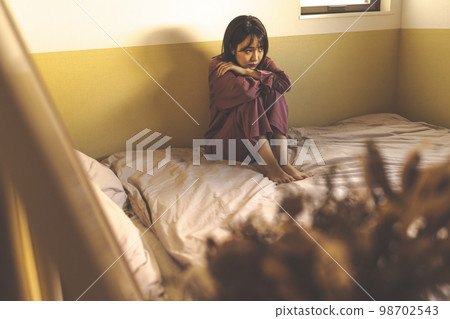 A woman in her 20s spending time at home 98702543