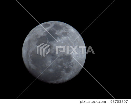 a Close up image of full moon as seen at night a Close up image of full moon as seen at night 98703807
