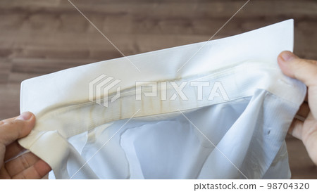 Dirt on shirt collar image Dirt on shirt collar image 98704320