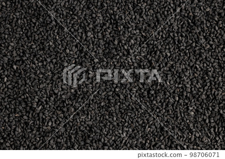 black cumin seeds as background top view black cumin seeds as background top view 98706071