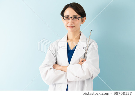 Young woman wearing a white coat medical image Young woman wearing a white coat medical image 98708137