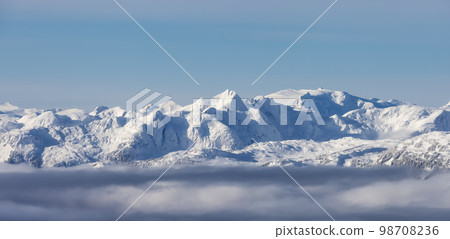 Snow and Cloud covered Canadian Nature Landscape Background. Whistler Snow and Cloud covered Canadian Nature Landscape Background. Whistler 98708236