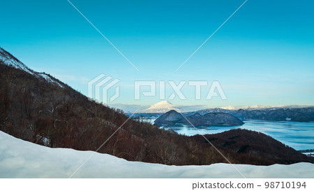 Beautiful winter view of Mountain Usuzan Beautiful winter view of Mountain Usuzan 98710194