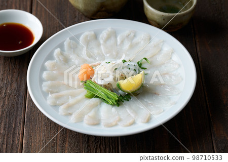 Thin sashimi of tiger blowfish 98710533