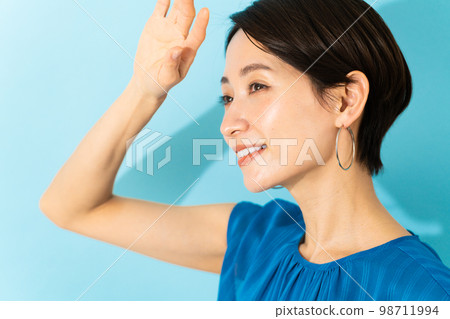 A young woman wearing a dress Summer image 98711994