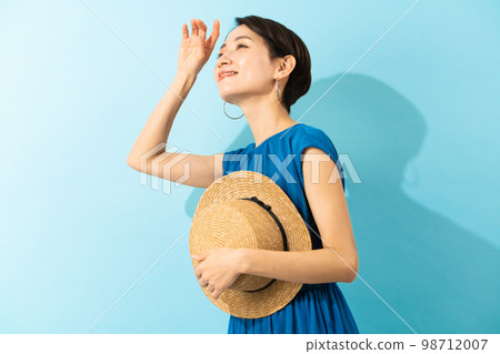 A young woman wearing a dress Summer image 98712007