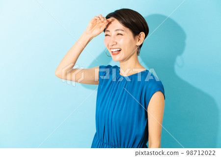 A young woman wearing a dress Summer image A young woman wearing a dress Summer image 98712022