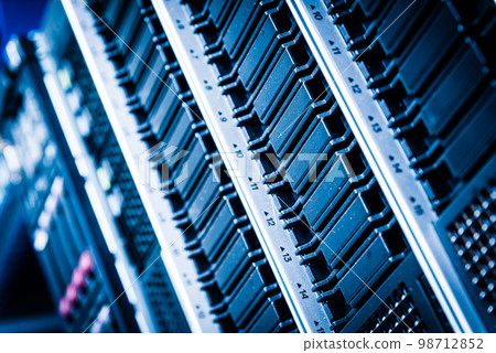 Row of hard disks used for data storage in internet data center 98712852