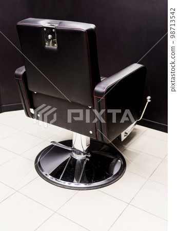vintage barber chair. 98713542